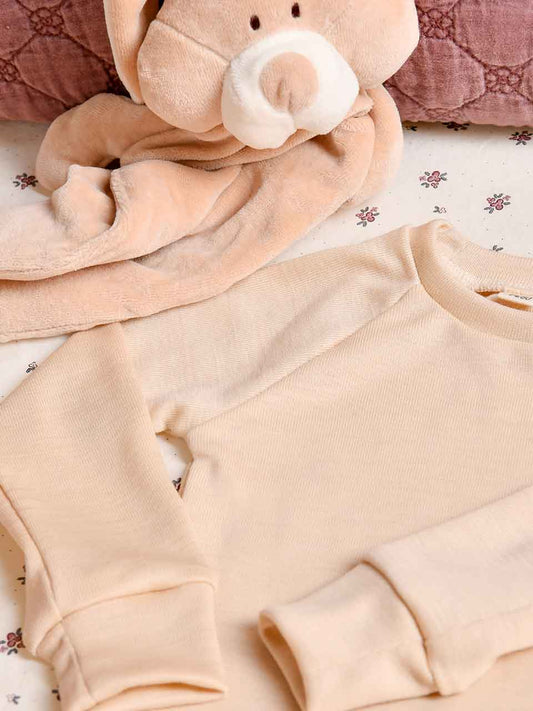 Langarmshirt aus Wolle Seide in der Farbe Beige für Babys im Alter von 0-2 Jahren.